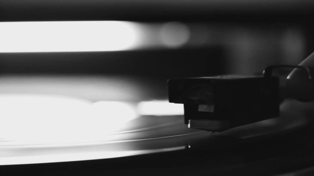 Close up pano of a record player playing vinyl