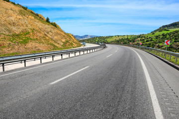 Highway under blue sky