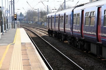 Fototapeta premium image of a local train approaching the station