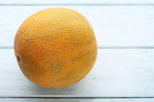 Sweet melon on wooden table
