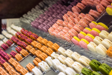 French desert, fresh colorful macarons in the bakery