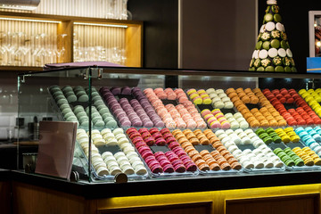 French desert, fresh colorful macarons in the bakery