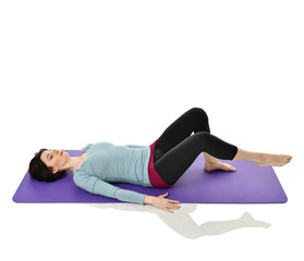 Mother woman exercising doing postnatal workout. Female fitness instructor stretching hands and...