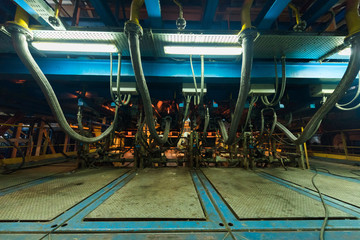 Fototapeta premium Fiberglass production industry equipment at manufacture background
