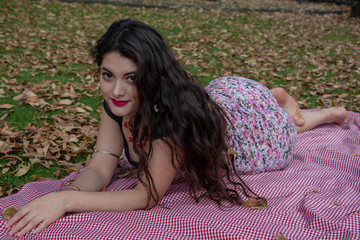 Gorgeous young latina relaxing in the park	
