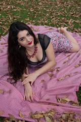 Naklejka premium Gorgeous young latina relaxy in the park