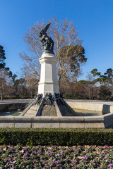 Fototapeta na wymiar Fountain of the Fallen Angel in The Retiro Park in City of Madrid, Spain 
