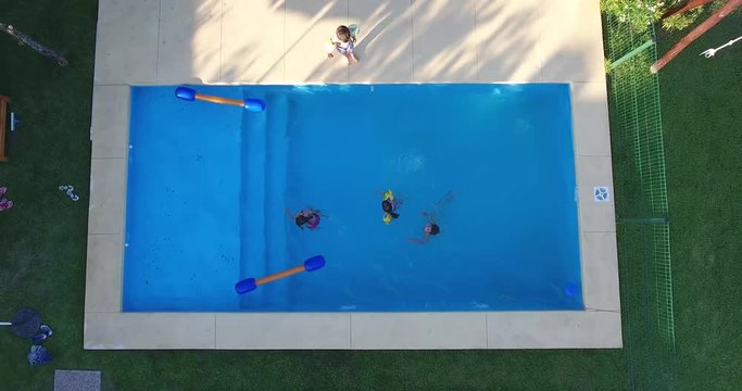 overhead pool with children
