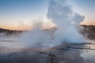 Steam coming out of geysers during sunrise at Tatio Geysers, Atacama desert, northern Chile.