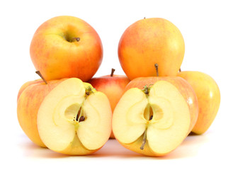 Red and yellow apples on white background