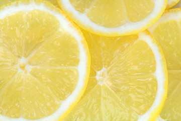 Background with citrus fruit of lemon slices