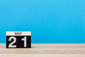 May 21st. Day 21 of month, calendar on blue background. Spring time, empty space for text