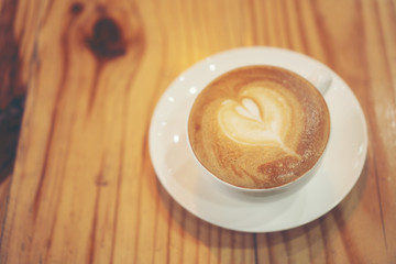 Cup of coffee latte in coffee shop