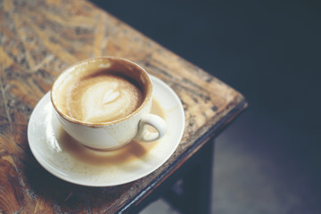 Cup of coffee latte in coffee shop
