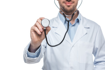 cropped shot of male doctor with stethoscope isolated on white background