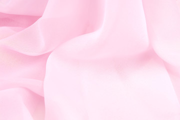 Obraz na płótnie Canvas Texture chiffon fabric pink color for backgrounds 