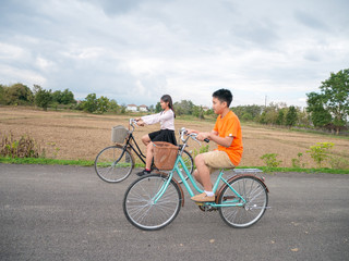 Fototapeta premium Family riding a bike
