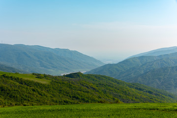 Fototapeta na wymiar Mountain landscape, green spring mountains, highlands