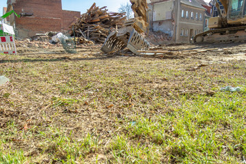 Digger bucket lies on a construction site