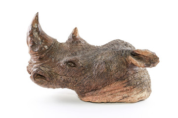 Wooden hand crafted rhinoceros from africa on white clean background 