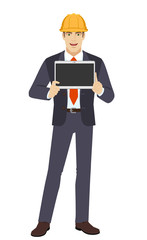 Businesswoman in construction helmet showing blank digital tablet PC