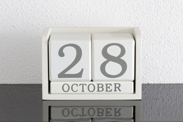 White block calendar present date 28 and month October