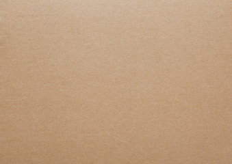 Brown cardboard sheet abstract texture or background.