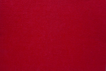 Texture of red fabric as a background.