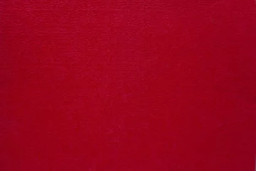 Afwasbaar Fotobehang Stof Texture of red fabric as a background.