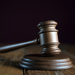 Judge's gavel in courtroom library. Law concept.