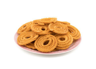 Indian Traditional Snack Chakli, a spiral shaped crisp deep fried snack, It is known as  Chakali, Murukku, Muruku, Murkoo, Chakri in Gujarat, Chakli in Maharashtra and Northern India
