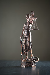 Legal office of lawyer. legal model statue of Themis goddess of justice.