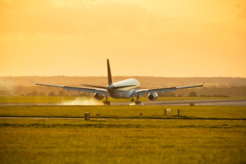 Fototapeta na wymiar Big commercial passengers airplane landing