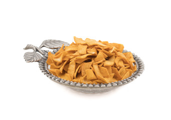 Indian Healthy Deep Fried Soya Chips Tea time Snack isolated on White Background