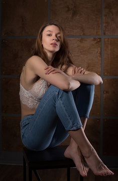 Test photo shoot for young pretty model wearing jeans and lace bra