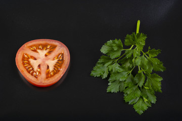 Vegan food on black plate