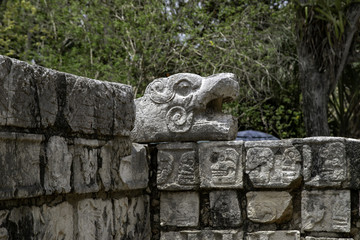 Fototapeta na wymiar And a few more jaguars located in Chichen Itza. The Jaguar and eagle platform has endured a magnificent history of several centuries