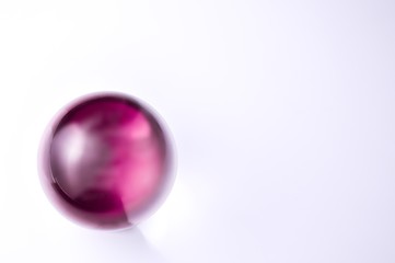 Purple or pink transparent crystal ball