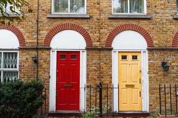 Doors and house facade in the English typical style, London, UK