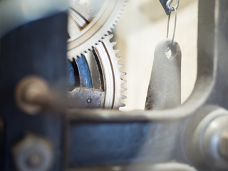 The mechanism of an old watch close-up.