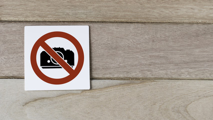no camera, photography sign on wood wall with space for adding text - 203883604