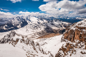 Snowy valley view from the top of Sass Pordoi, Dolomites