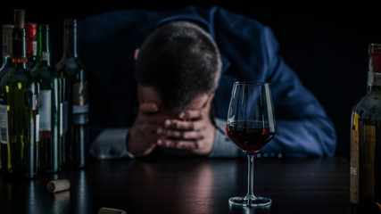 Businessman drunk by wine. Elegant alcoholic.