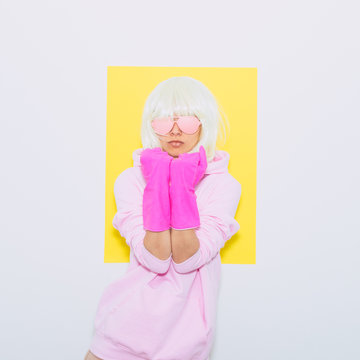 Tomboy Doll Blonde Girl in Fashion pink accessory sunglasses, hoodie and shorts. Club Party Style. Synth wave vibes