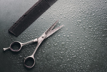 Stylish Professional Barber Scissors, Hair Cutting on black background. Hairdresser salon concept,...