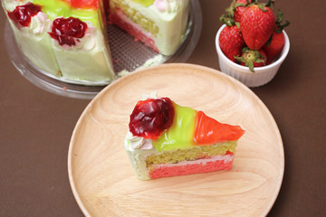 Piece of cake and strawberry kiwi jam topping