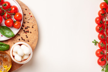 Tomatoes, basil, mozzarella cheese. Caprese salad ingredients