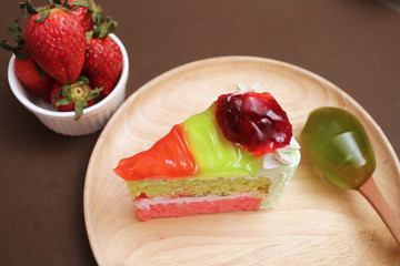 Piece of cake and strawberry kiwi jam topping