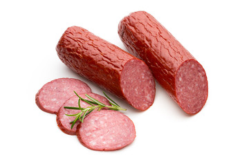 Salami smoked sausage, basil leaves on white background cutout.