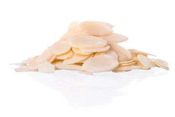 Sliced almonds isolated white background